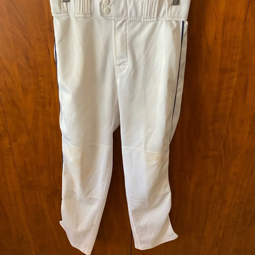 Rawlings Hemmed Baseball Pants with navy blue piping. Youth XL